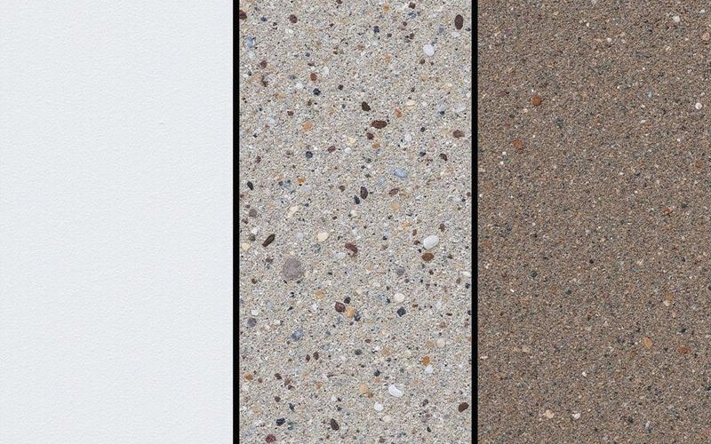Comparison of pool finish options showing plaster quartz and pebble tec side by side samples